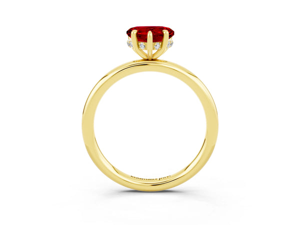 Yellow gold Heart Cut Ruby Solitaire Ring with Thin Band and Four-Prong Setting