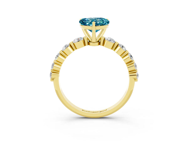 Yellow gold Heart Cut Solitaire Blue Topaz Ring with Pave Band and Four-Prong Setting