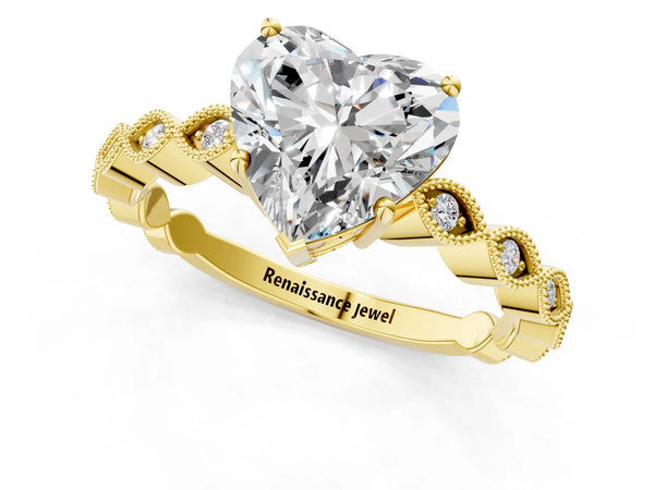 Yellow gold Heart Cut Solitaire Diamond Ring with Infinity Twist Band and Four-Prong Setting