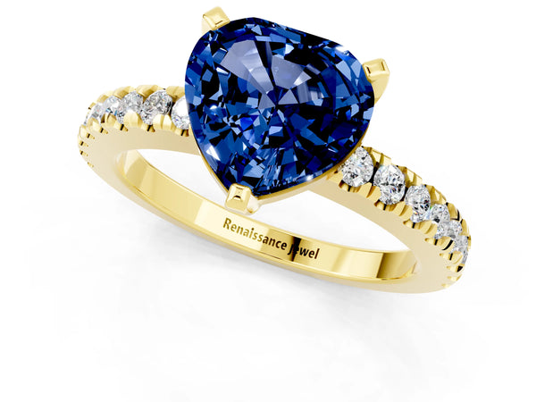Yellow gold Heart Cut Solitaire Blue Sapphire with Pavé Band and Four-Prong Setting