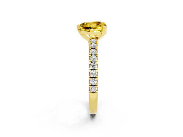Yellow gold Heart Cut Solitaire Yellow Sapphire with Pavé Band and Four-Prong Setting