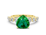 Yellow gold Heart Cut Solitaire Emerald Ring with Pave Band and Four-Prong Setting
