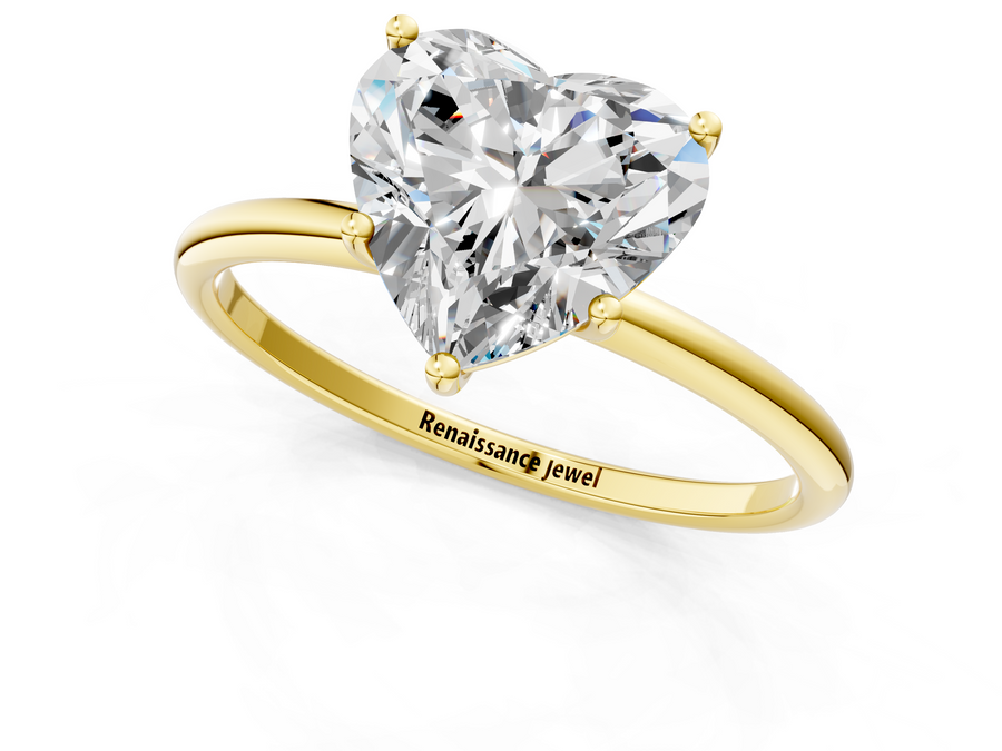 Yellow gold Heart Cut Solitaire Engagement Ring with Thin Band and Four-Prong Setting