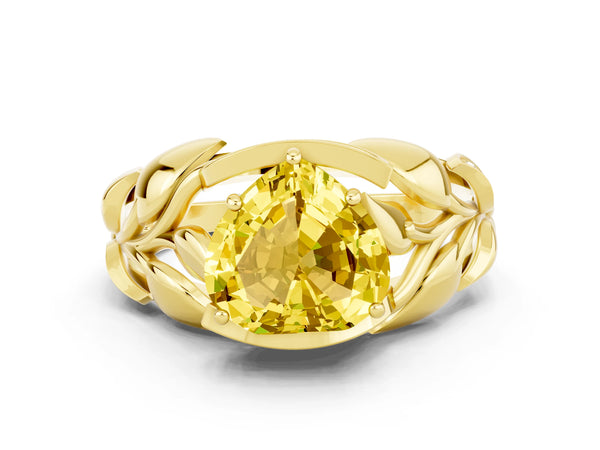 Yellow gold Heart Cut Yellow Sapphire Leaf-Inspired Engagement Ring with Round Accents and Prong Setting