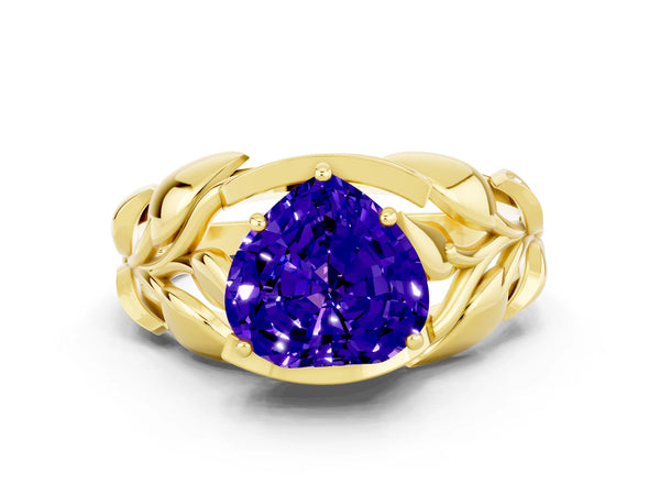 Yellow gold Heart Cut Tanzanite Leaf-Inspired Engagement Ring with Round Accents and Prong Setting