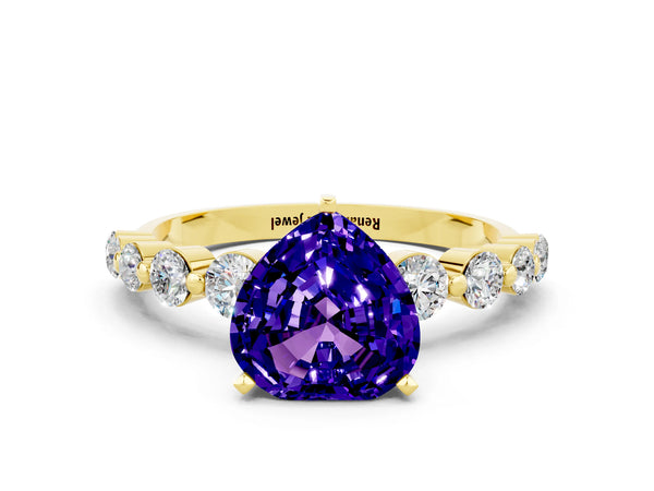 Yellow gold Heart Cut Solitaire Tanzanite Ring with Pave Band and Four-Prong Setting