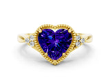 Yellow gold Heart Cut Tanzanite Halo Ring with Tapered Band and Four-Prong Setting