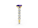 Yellow gold Heart Cut Tanzanite Prong Setting with Side Stones on a Pave Band_2