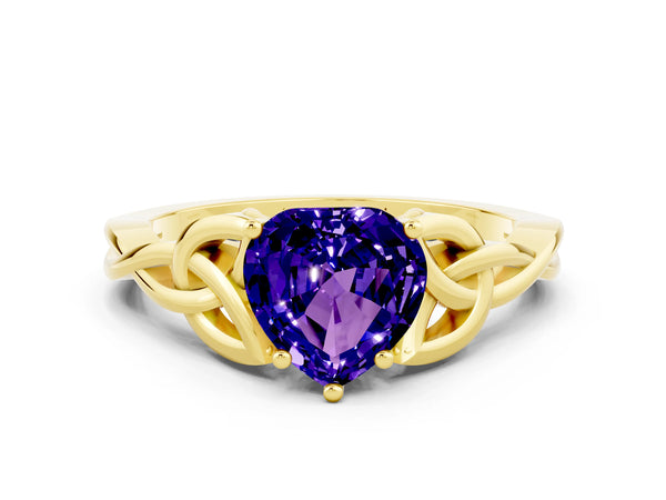 Yellow gold Heart Cut Tanzanite Solitaire Celtic Knot Ring with Four-Prong Setting