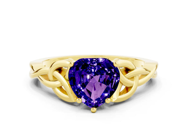 Yellow gold Heart Cut Tanzanite Solitaire Engagement Ring with Celtic Knot Band and Four-Prong Setting