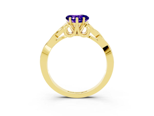 Yellow gold Heart Cut Tanzanite Solitaire Engagement Ring with Celtic Knot Band and Four-Prong Setting