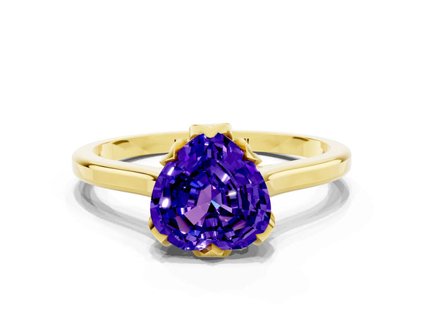Yellow gold Heart Cut Tanzanite Solitaire Ring with Flower Prong Setting and Classic Band