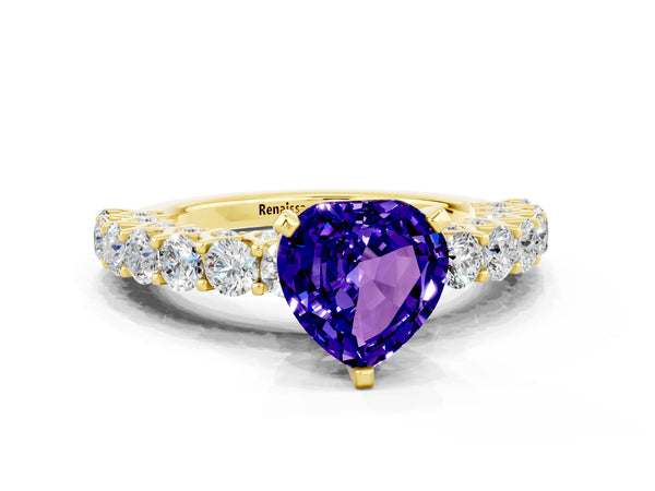 Yellow gold Heart Cut Tanzanite Solitaire Ring with Shared Prong Pavé Band and Four-Prong Setting