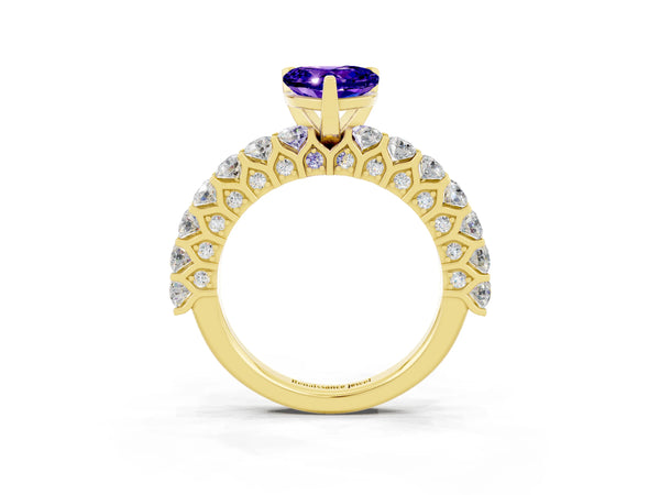 Yellow gold Heart Cut Tanzanite Solitaire Ring with Shared Prong Pavé Band and Four-Prong Setting