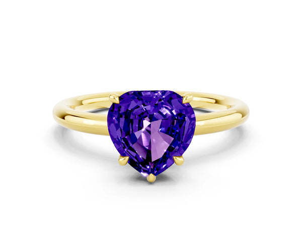 Yellow gold Heart Cut Tanzanite Solitaire Ring with Thin Band and Four-Prong Setting