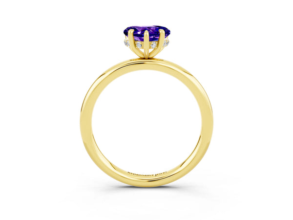 Yellow gold Heart Cut Tanzanite Solitaire Ring with Thin Band and Four-Prong Setting