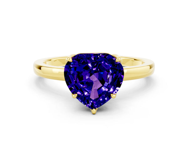 Yellow gold Heart Cut Tanzanite Solitaire Ring with Thin Band and Prong Setting