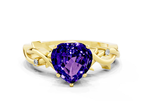 Yellow gold Heart Cut Tanzanite Solitaire Ring with Twisted Band and Prong Setting