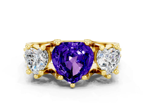 Yellow gold Heart Cut Tanzanite Three-Stone Ring with Channel Set Band and Four-Prong Setting