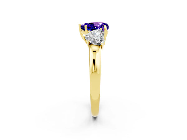Yellow gold Heart Cut Tanzanite Three-Stone Ring with Four-Prong Setting and Classic Band