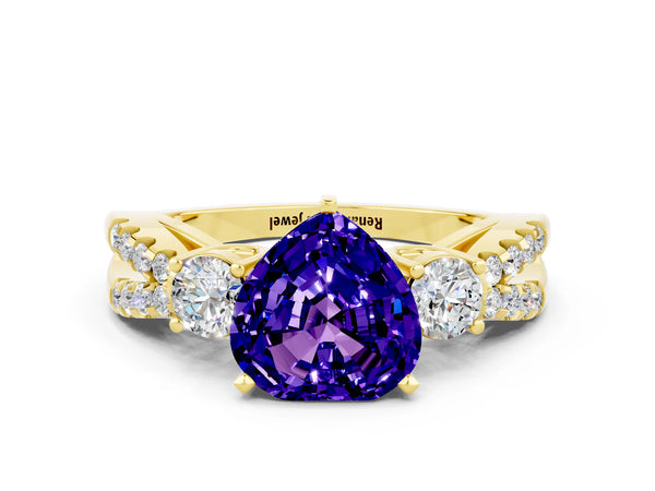 Yellow gold Heart Cut Tanzanite Three-Stone Ring with Pavé Split Shank and Four-Prong Setting