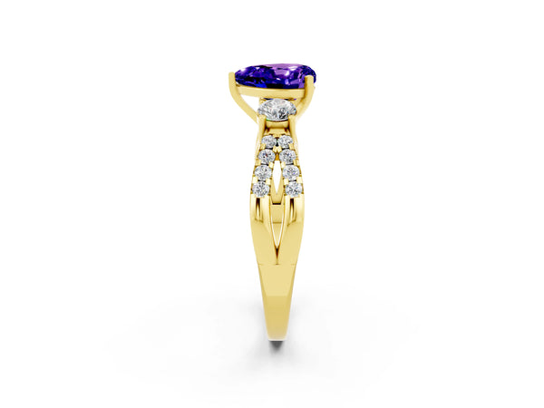 Yellow gold Heart Cut Tanzanite Three-Stone Ring with Pavé Split Shank and Four-Prong Setting