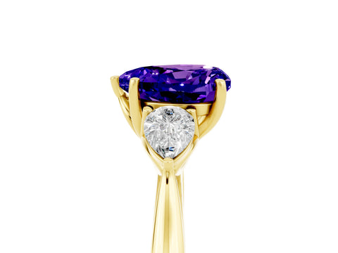 Yellow gold Heart Cut Tanzanite Three-Stone Ring with Pear Side Stones and Four-Prong Setting_17
