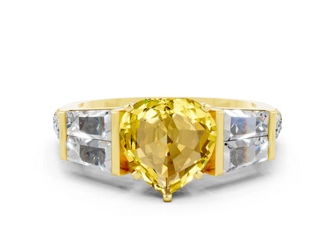 Yellow gold Heart Cut Yellow Sapphire Engagement Ring with Baguette Side Stones and Channel Set Band