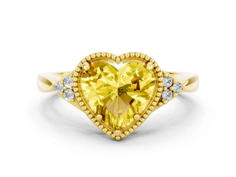 Yellow gold Heart Cut Yellow Sapphire Halo Ring with Tapered Band and Four-Prong Setting