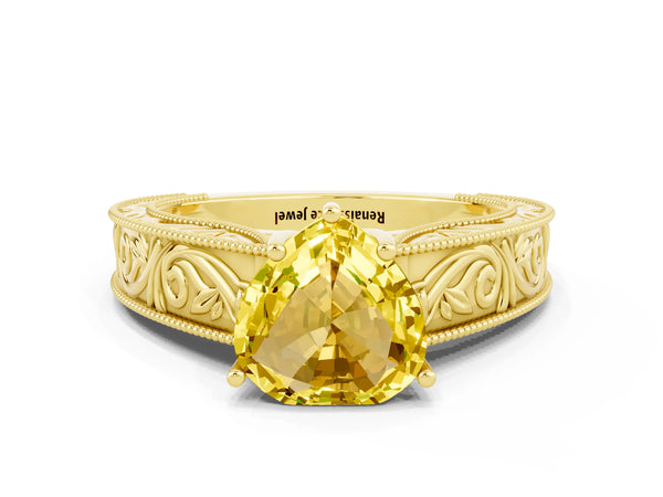 Yellow gold Heart Cut Yellow Sapphire Solitaire Ring with Engraved Band and Four-Prong Setting