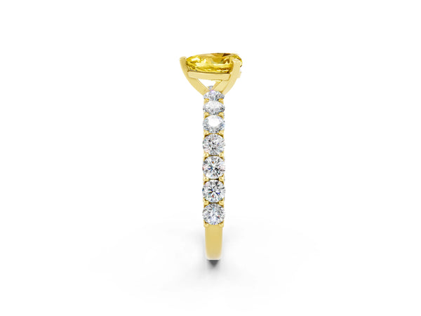 Yellow gold Heart Cut Yellow Sapphire Solitaire Ring with Shared Prong Pavé Band and Four-Prong Setting
