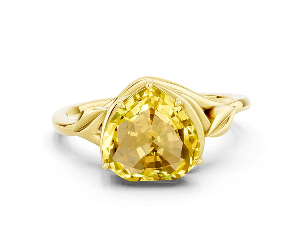 Yellow gold Heart Cut Yellow Sapphire Solitaire Ring with Twist Band and Four-Prong Setting