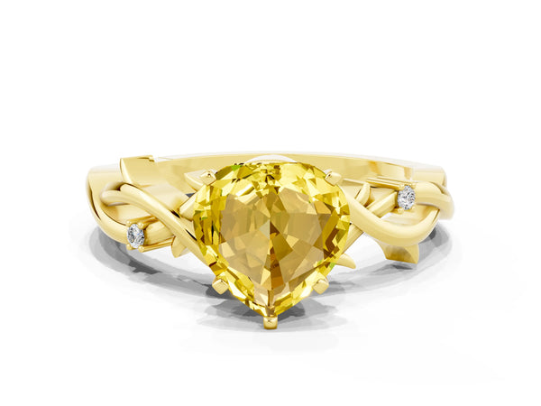 Yellow gold Heart Cut Yellow Sapphire Solitaire Ring with Twisted Band and Prong Setting
