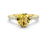 Yellow gold Heart Cut Yellow Sapphire Solitaire with Side Stones on a Pavé Band and Four-Prong Setting_24