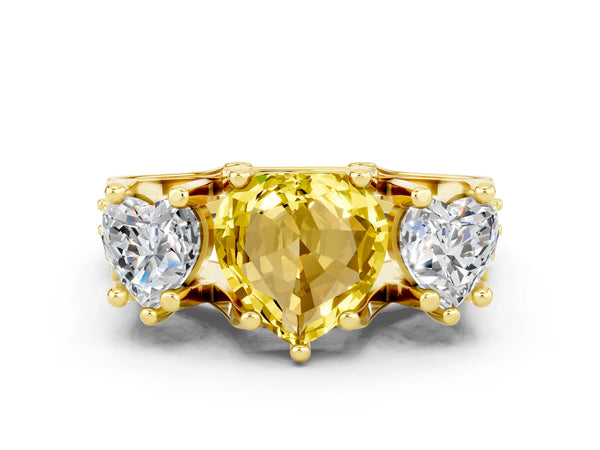 Yellow gold Heart Cut Yellow Sapphire Three-Stone Ring with Channel Set Band and Four-Prong Setting