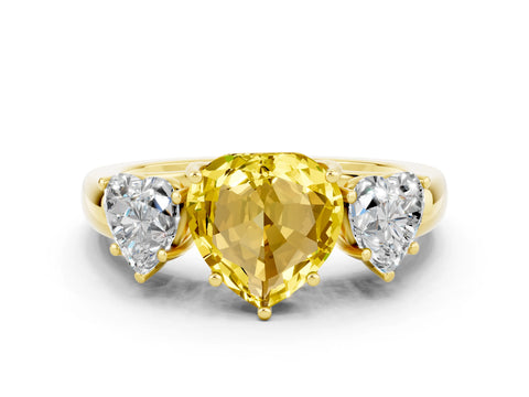 Yellow gold Heart Cut Yellow Sapphire Three-Stone Ring with Four-Prong Setting and Classic Band