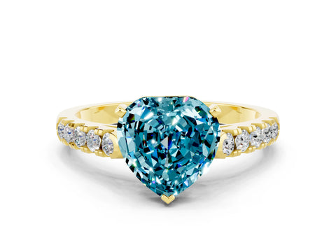 Yellow gold Heart Cut {stone} Solitaire Ring with Pavé Band and Four Prong Setting