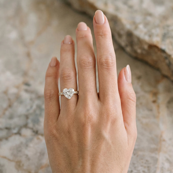 Yellow gold Heart Solitaire Diamond Engagement Ring with Pavé Band and Six-Prong Setting