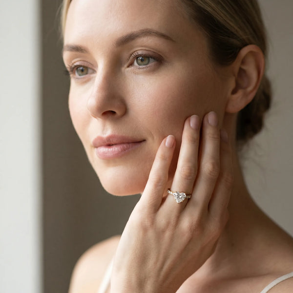 Yellow gold Heart Solitaire Diamond Engagement Ring with Pavé Band and Six-Prong Setting