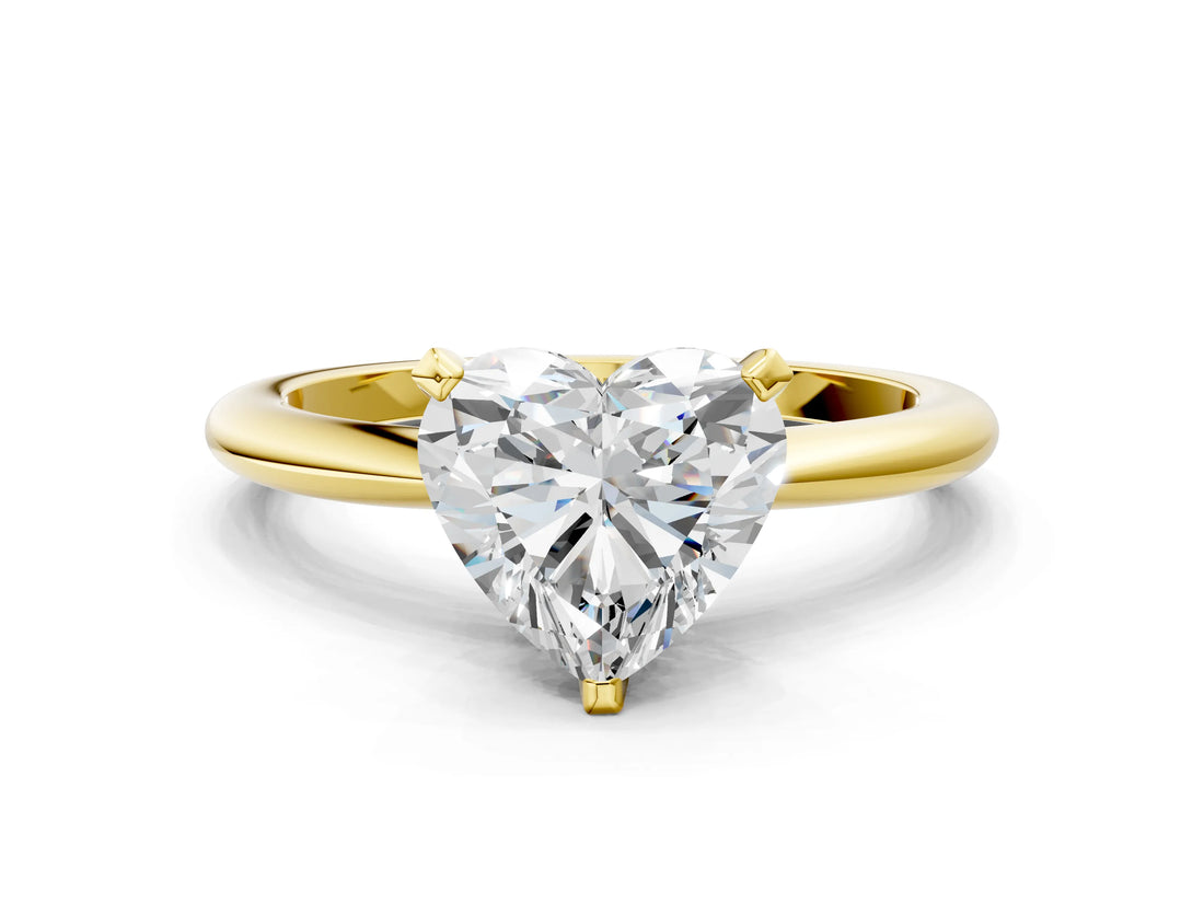 Yellow gold Heart Solitaire Diamond Ring with Six-Prong Setting on a Classic Band