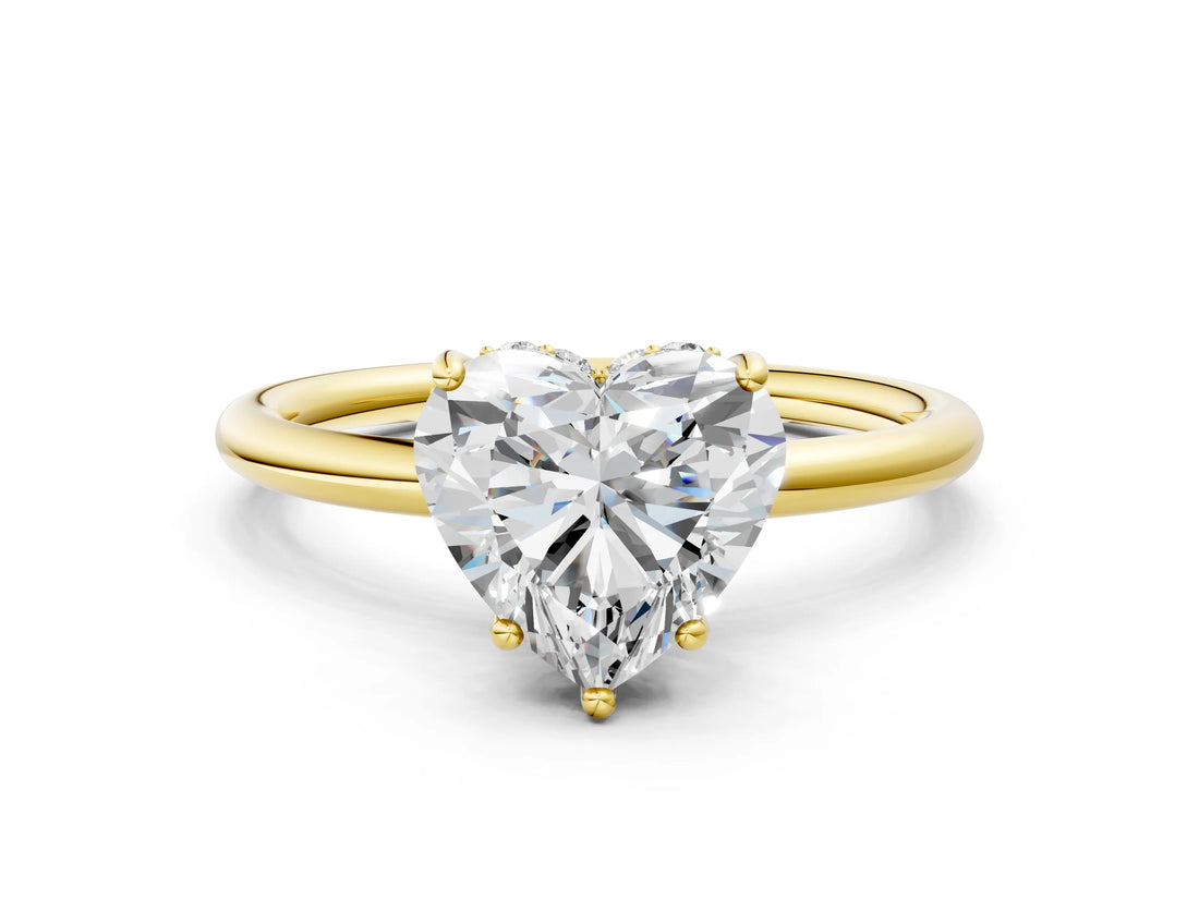 Yellow gold Heart Solitaire Diamond Ring with a Classic Band and Four-Prong Setting
