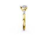 Yellow gold Heart Solitaire with Tapered Baguette Side Stones on a Classic Band with Four-Prong Setting_131