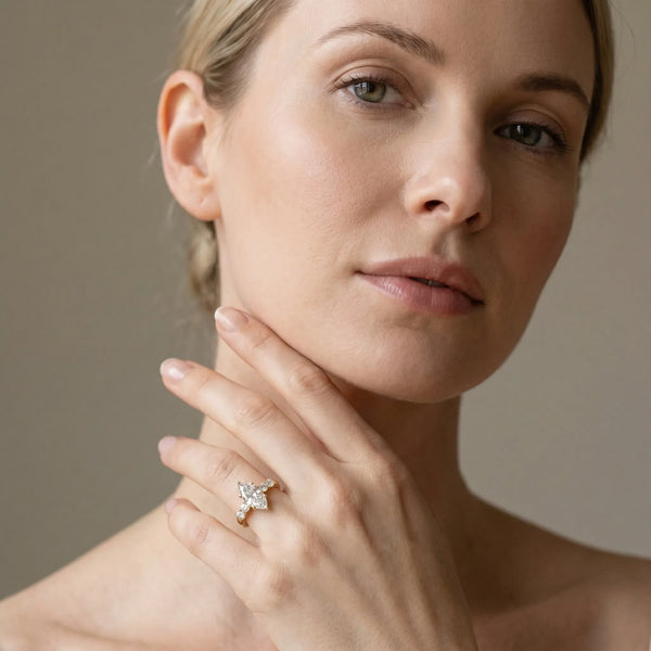 10K Yellow Gold 1.65 Carat E VS1 Marquise Brilliant Diamond Five-Stone Engagement Ring with Prong Setting on a Classic Band