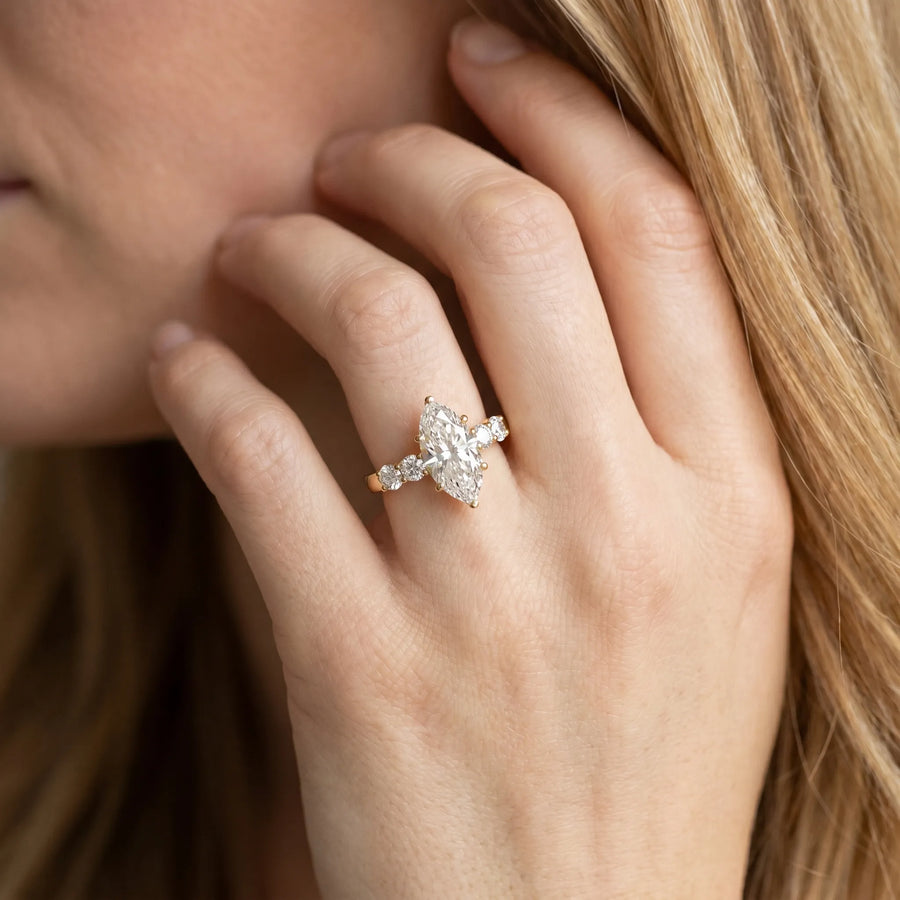 Yellow gold Marquise Brilliant Diamond Five-Stone Engagement Ring with Prong Setting on a Classic Band