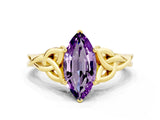 Yellow gold Marquise Cut Amethyst Solitaire Engagement Ring with Celtic Knot Band and Four-Prong Setting