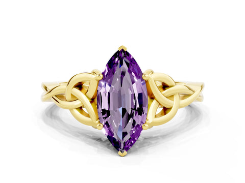 Yellow gold Marquise Cut Amethyst Solitaire Engagement Ring with Celtic Knot Band and Four-Prong Setting