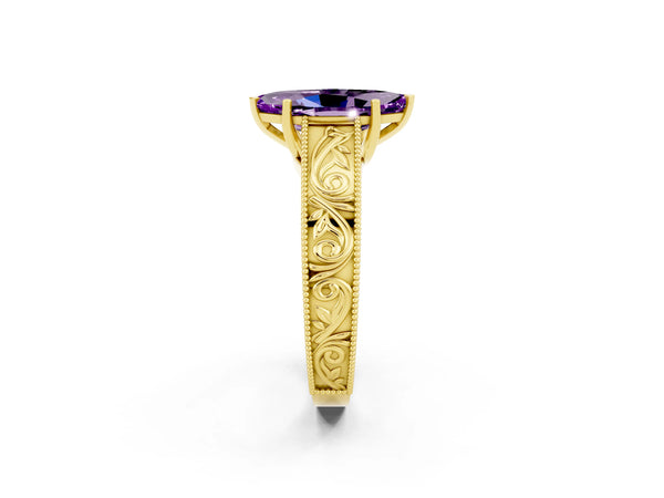 Yellow gold Marquise Cut Amethyst Solitaire Ring with Engraved Band and Four-Prong Setting