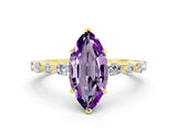Yellow gold Marquise Cut Amethyst Solitaire with Side Stones on a Pavé Band and Four-Prong Setting