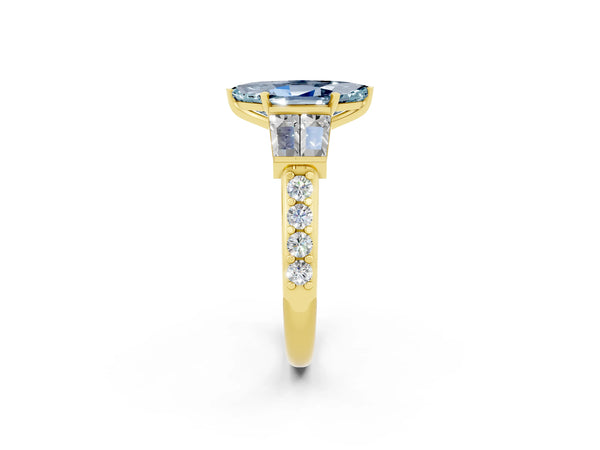 Yellow gold Marquise Cut Aquamarine Engagement Ring with Baguette Side Stones and Channel Set Band