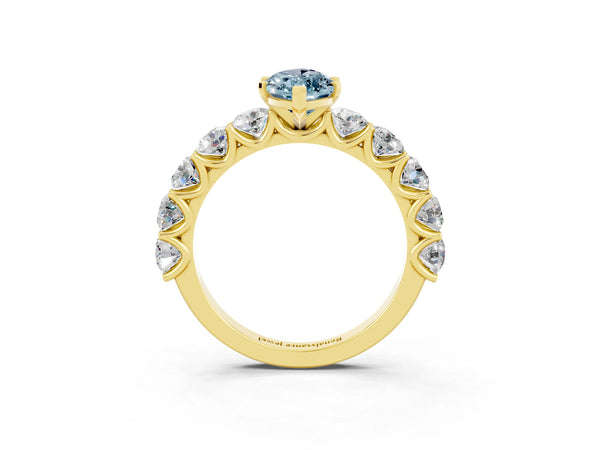 Yellow gold Marquise Cut Aquamarine Prong Setting with Side Stones on a Pave Band